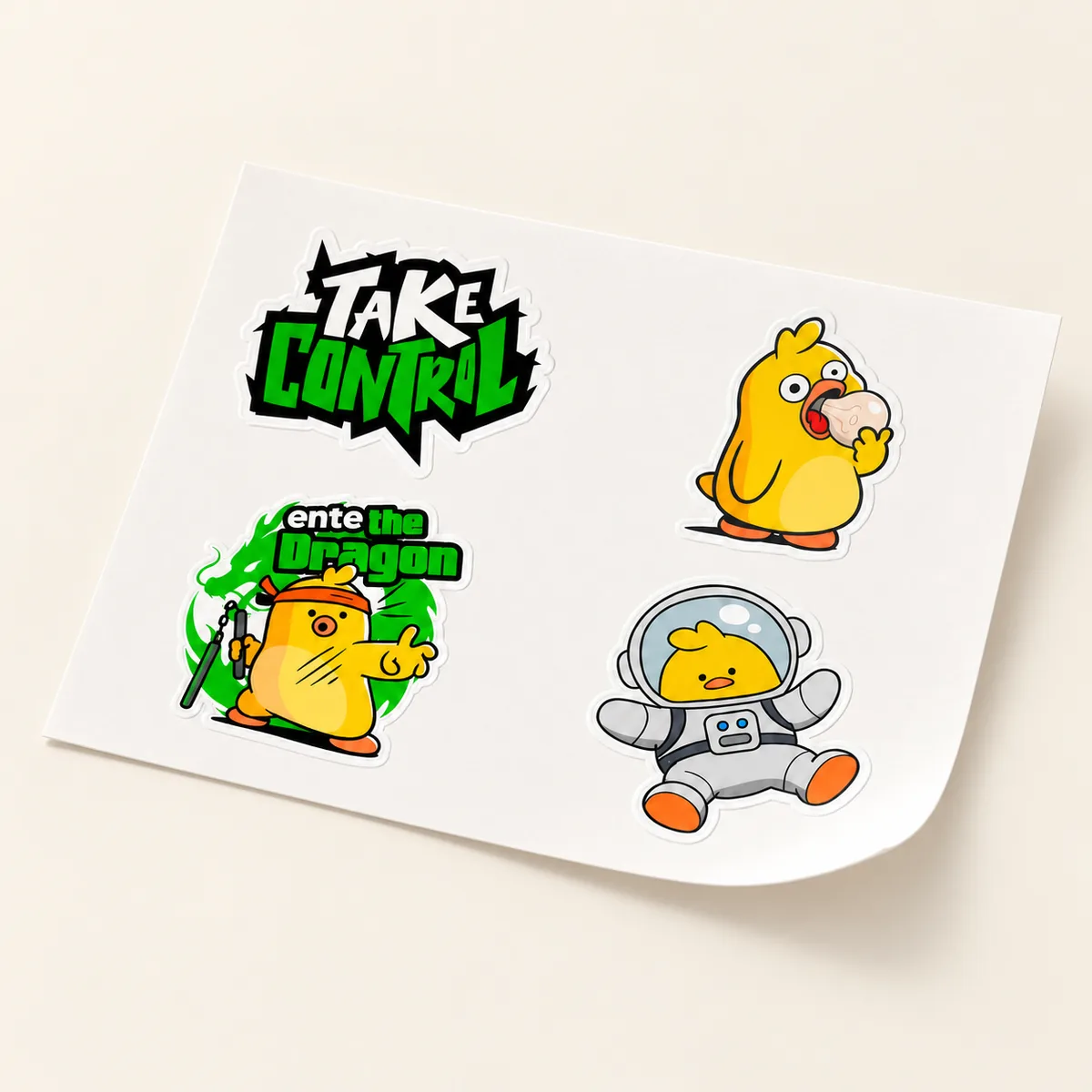 Sticker sheet with Take Control, an ice-cream duck, Ente the Dragon and an astronaut duck
