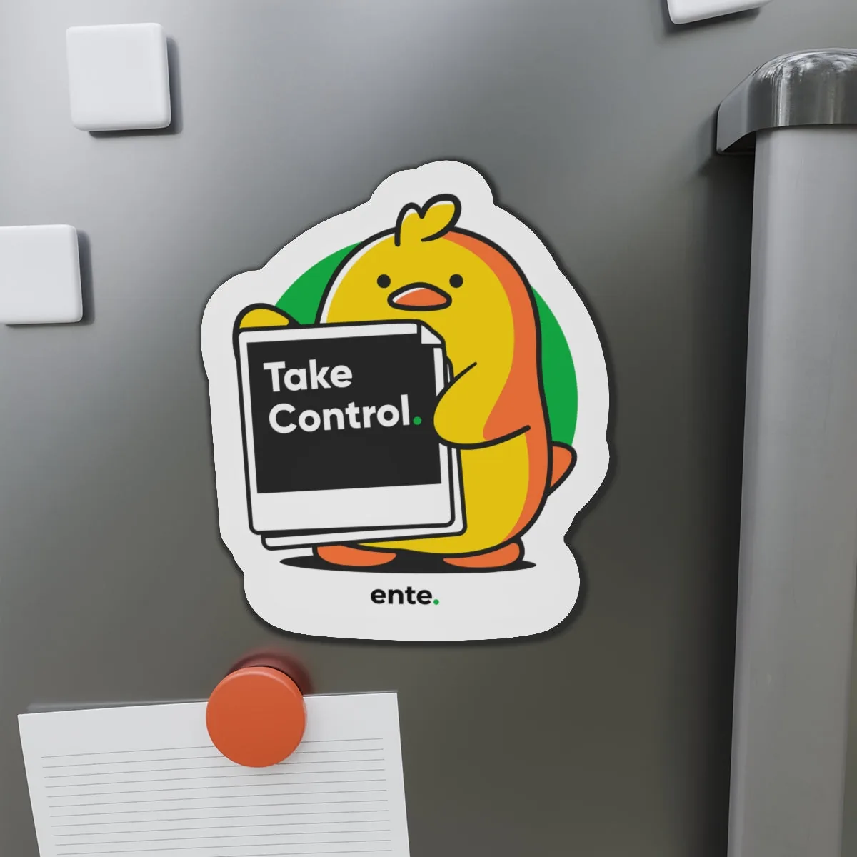 Take Control duck magnet on a steel fridge