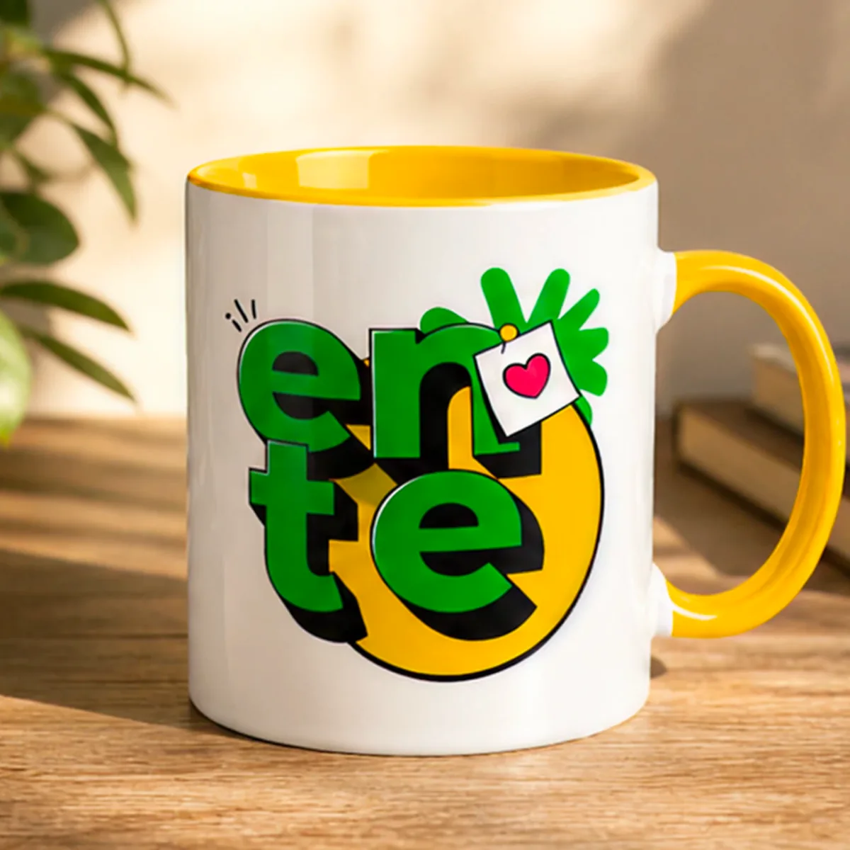 White mug with a yellow handle and the ente duck logo